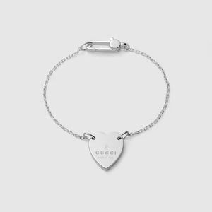 Gucci silver heart pendant bracelet